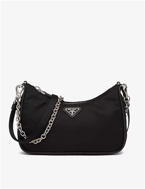 prada chain-embellished leather and recycled-nylon shoulder bag|Prada 2000 shoulder bag.